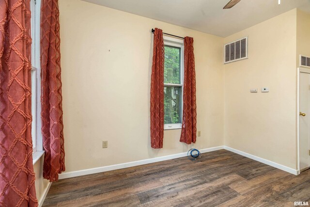 2016 Division St, Murphysboro, IL 62966 - empty room with ceiling fan, baseboards, dark wood-style floors, and visible vents