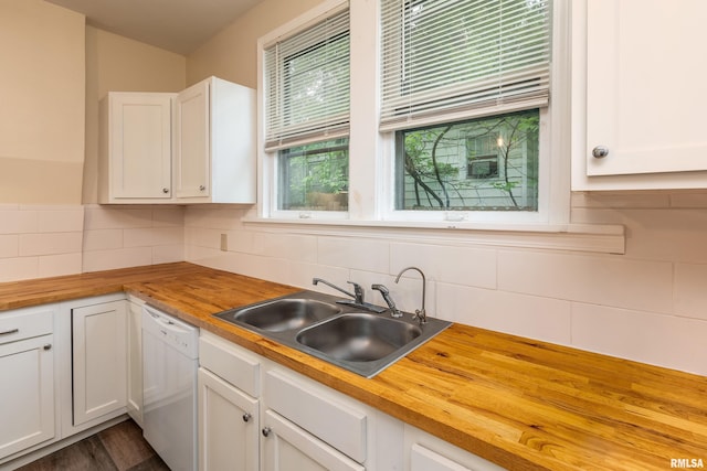 2016 Division St, Murphysboro, IL 62966 - kitchen featuring dishwasher, butcher block counters, a sink, white cabinetry, and backsplash