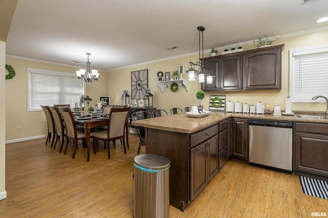 kitchen with a sink, a peninsula, light wood-type flooring, stainless steel dishwasher, and dark brown cabinets