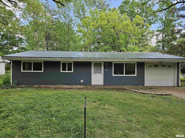 1027 W Laurel St, Carbondale, IL 62901 - ranch-style house featuring a front lawn and metal roof