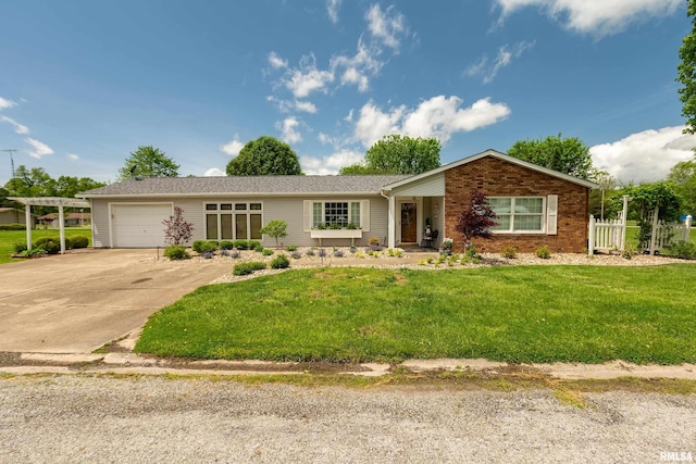 24 Karen Dr, Christopher, IL 62822 - ranch-style home featuring a front lawn, driveway, and an attached garage