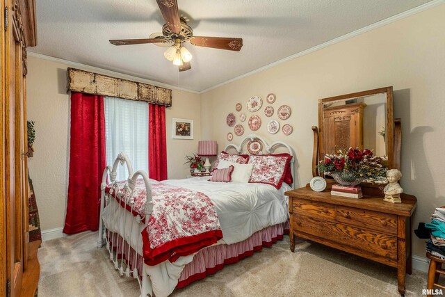 24 Karen Dr, Christopher, IL 62822 - bedroom with crown molding, carpet, baseboards, and ceiling fan