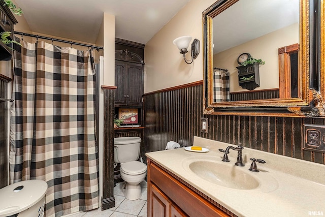 24 Karen Dr, Christopher, IL 62822 - full bath featuring toilet, a wainscoted wall, vanity, curtained shower, and tile patterned flooring