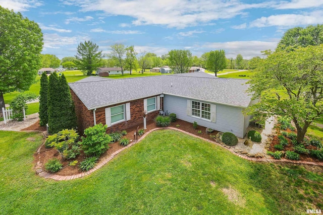 24 Karen Dr, Christopher, IL 62822 - ranch-style home featuring a shingled roof, a front lawn, and brick siding