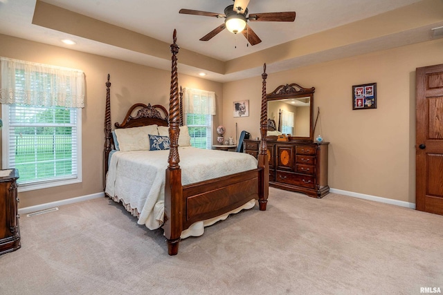 bedroom with a ceiling fan, recessed lighting, baseboards, visible vents, and light carpet