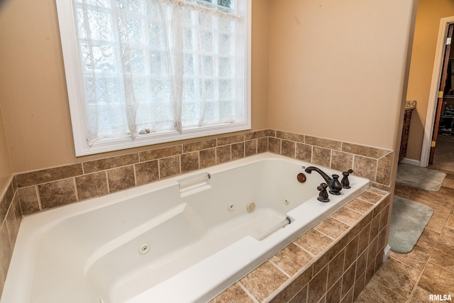 bathroom featuring a jetted tub