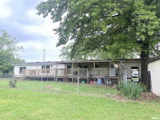 exterior space featuring fence and a lawn