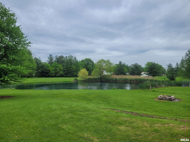 325 W N St, Dix, IL 62830 - view of yard featuring a water view and an outdoor fire pit