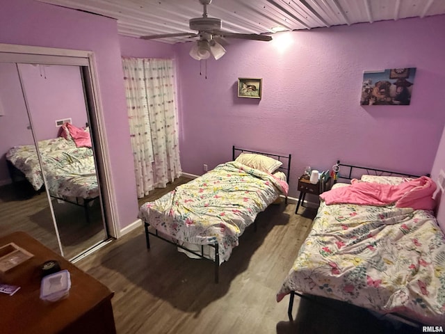 85 W State Highway 146, Golconda, IL 62938 - bedroom featuring a ceiling fan, baseboards, a closet, and light wood-style flooring