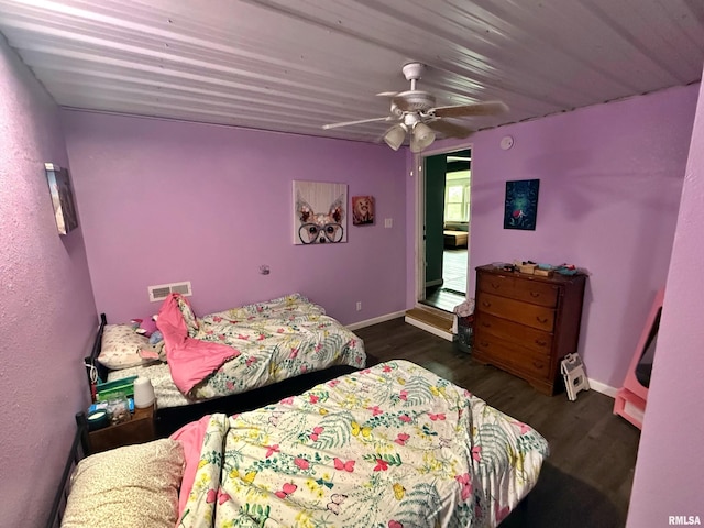 85 W State Highway 146, Golconda, IL 62938 - bedroom featuring baseboards, ceiling fan, visible vents, and wood finished floors