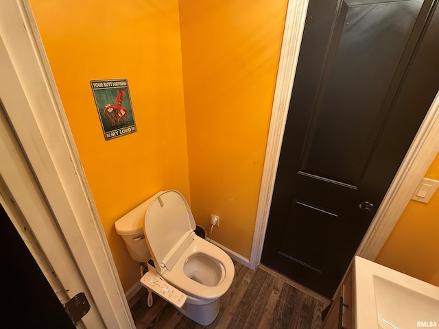 85 W State Highway 146, Golconda, IL 62938 - bathroom with toilet, wood finished floors, and baseboards