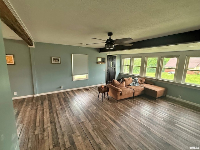 85 W State Highway 146, Golconda, IL 62938 - living area featuring a textured ceiling, wood finished floors, baseboards, and ceiling fan