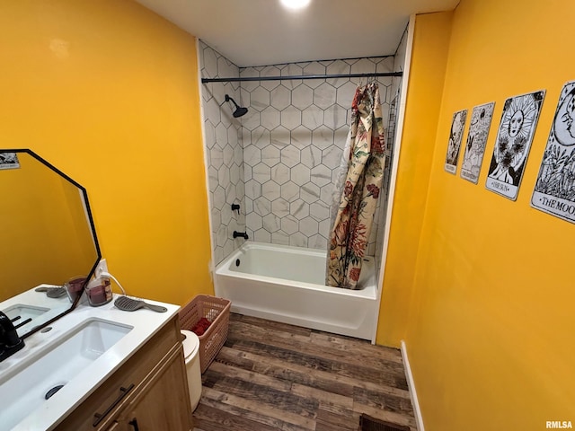 85 W State Highway 146, Golconda, IL 62938 - full bathroom featuring vanity, shower / bath combo with shower curtain, and wood finished floors