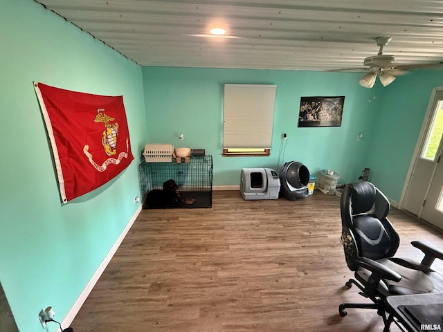 85 W State Highway 146, Golconda, IL 62938 - interior space featuring baseboards, ceiling fan, and wood finished floors