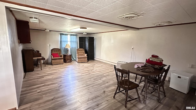 1908 E Oak St, West Frankfort, IL 62896 - interior space with baseboards, ornamental molding, and wood finished floors