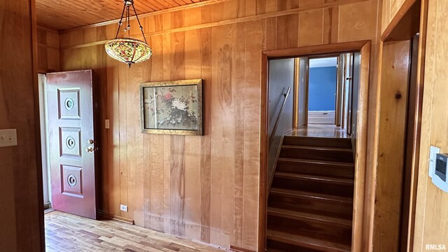 1908 E Oak St, West Frankfort, IL 62896 - stairs featuring wooden walls, wood ceiling, and wood finished floors