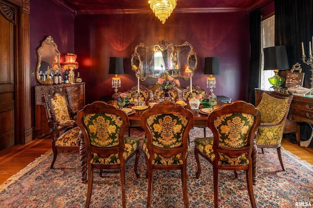 301 W High St, Anna, IL 62906 - dining area featuring a chandelier, crown molding, and wood finished floors