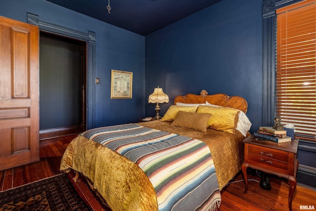 301 W High St, Anna, IL 62906 - bedroom featuring hardwood / wood-style floors and baseboards