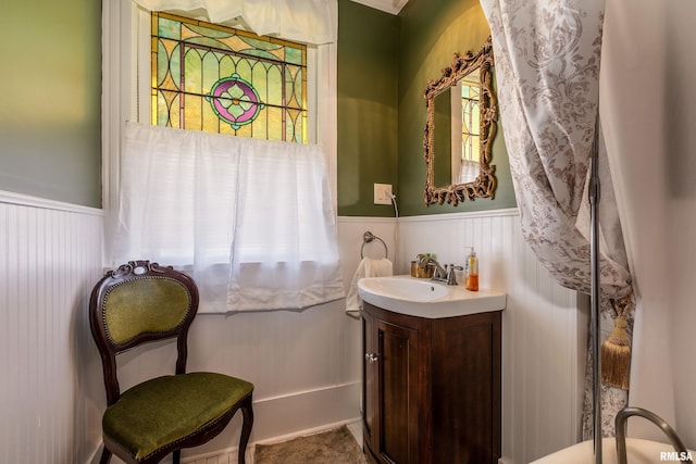 301 W High St, Anna, IL 62906 - bathroom with wainscoting, healthy amount of natural light, and vanity