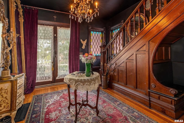 301 W High St, Anna, IL 62906 - foyer entrance featuring a chandelier, stairs, and wood finished floors