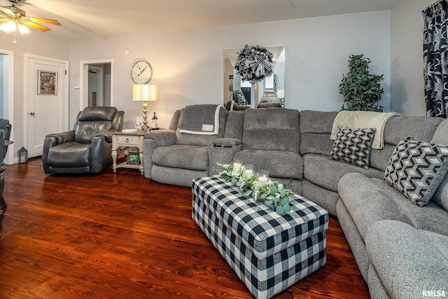 living room with wood finished floors and a ceiling fan