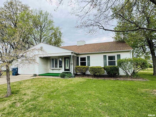 single story home with a garage, concrete driveway, and a front yard