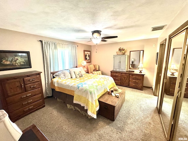 7 Lakewood Dr, Centralia, IL 62801 - bedroom with light colored carpet and a ceiling fan