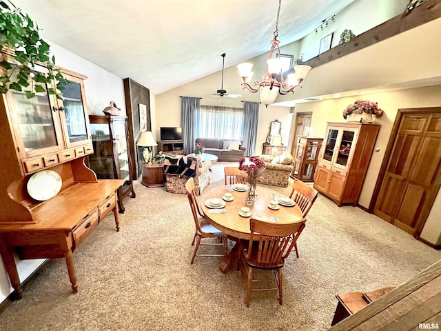7 Lakewood Dr, Centralia, IL 62801 - dining area featuring light carpet, a chandelier, vaulted ceiling, and a ceiling fan