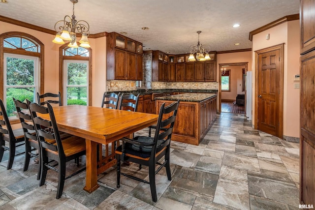 500 Swink Ln, Jonesboro, IL 62952 - dining space with a chandelier, ornamental molding, stone tile flooring, baseboards, and recessed lighting