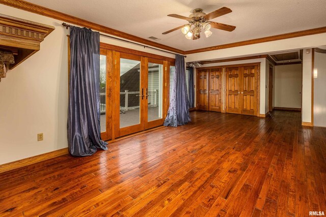 500 Swink Ln, Jonesboro, IL 62952 - unfurnished bedroom with access to outside, french doors, wood-type flooring, baseboards, and crown molding