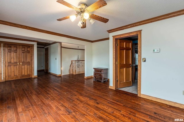 500 Swink Ln, Jonesboro, IL 62952 - unfurnished living room with hardwood / wood-style floors, a ceiling fan, crown molding, and baseboards