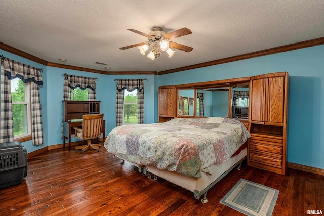 500 Swink Ln, Jonesboro, IL 62952 - bedroom featuring ornamental molding, baseboards, dark wood-style floors, a textured ceiling, and a ceiling fan