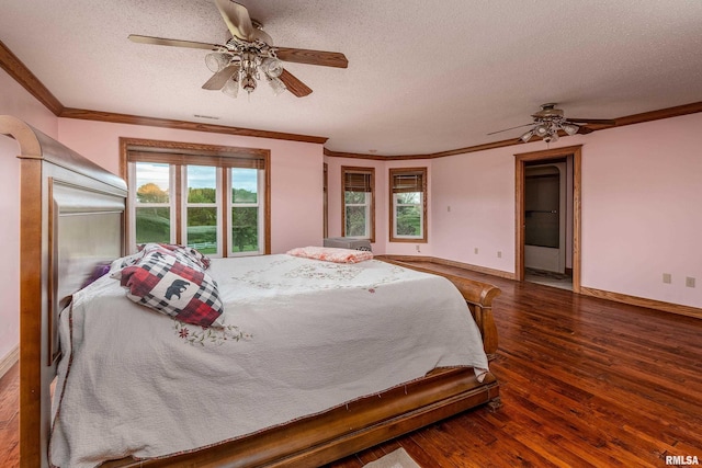 500 Swink Ln, Jonesboro, IL 62952 - bedroom featuring a textured ceiling, crown molding, wood finished floors, baseboards, and ceiling fan