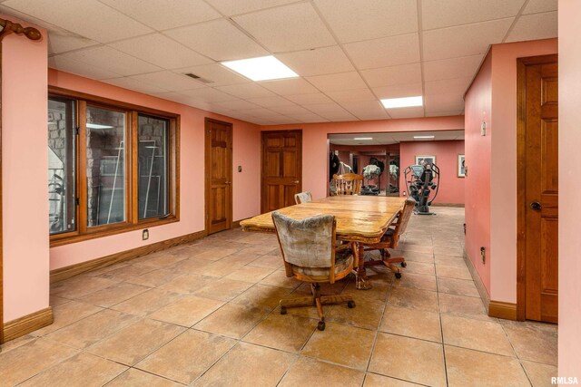500 Swink Ln, Jonesboro, IL 62952 - dining area with a drop ceiling, baseboards, and light tile patterned floors