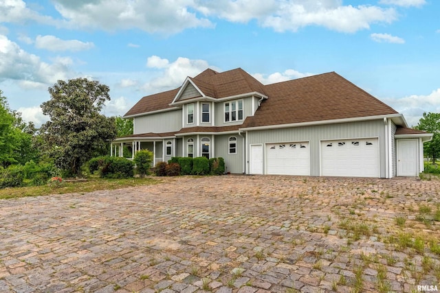 500 Swink Ln, Jonesboro, IL 62952 - view of front of property featuring a garage and decorative driveway