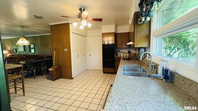 15048 State Highway 14, Benton, IL 62812 - kitchen with a sink, black appliances, ceiling fan, decorative light fixtures, and light tile patterned floors