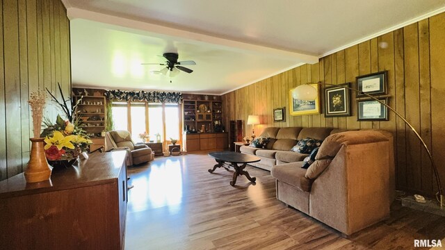 15048 State Highway 14, Benton, IL 62812 - living room featuring wooden walls, wood finished floors, and a ceiling fan