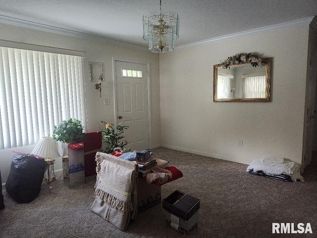 carpeted living room with ornamental molding, a chandelier, and baseboards