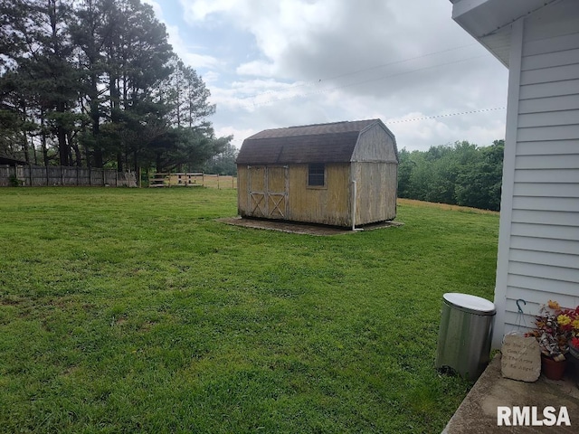view of yard with a storage unit and an outdoor structure