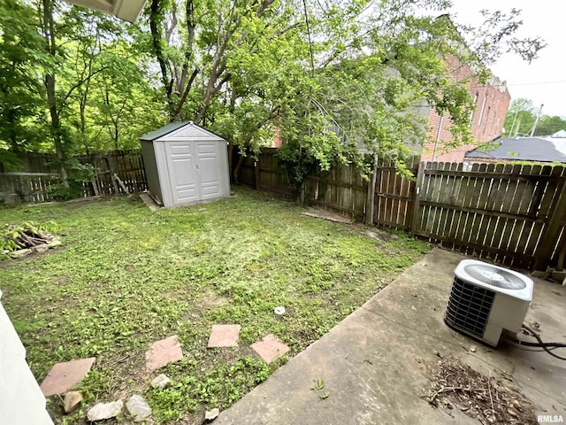 104 W Maple St, Cobden, IL 62920 - view of yard with central AC, a shed, an outdoor structure, and a patio