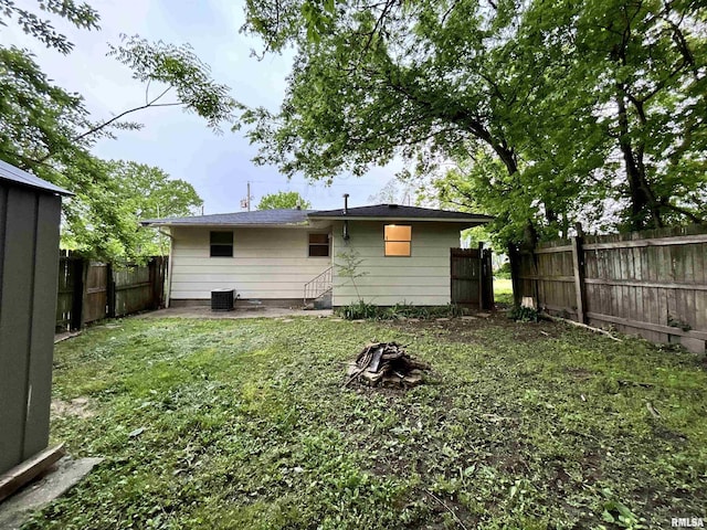 104 W Maple St, Cobden, IL 62920 - back of house featuring a fenced backyard, entry steps, and a patio