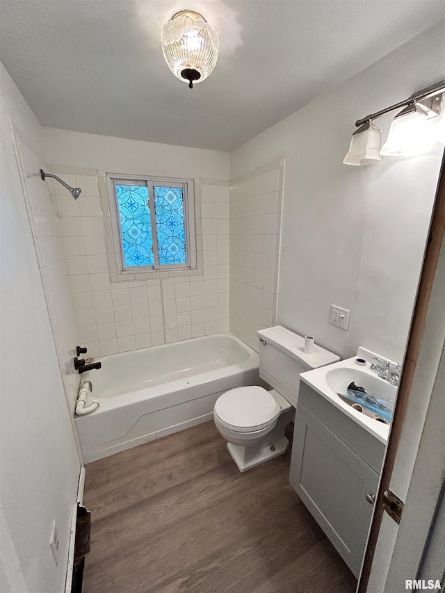 104 W Maple St, Cobden, IL 62920 - full bath with wood finished floors, toilet, shower / bath combination, and vanity