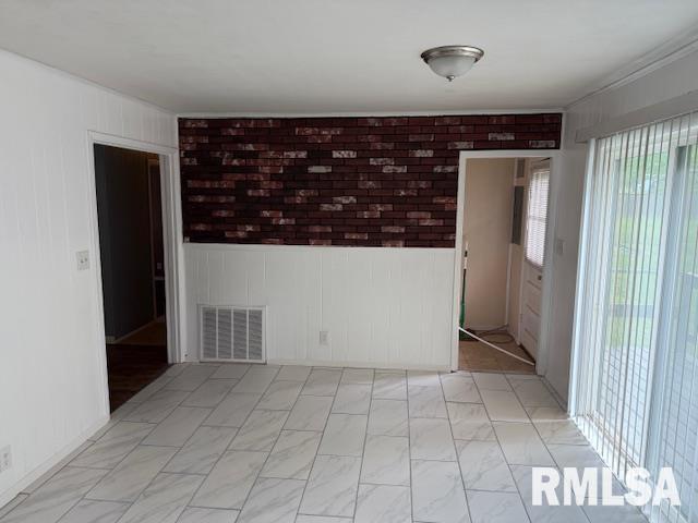 1308 Main St, Carterville, IL 62918 - empty room featuring wainscoting