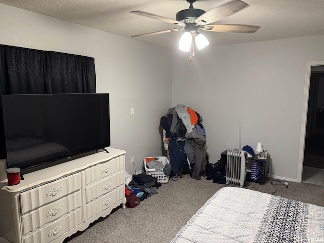 11729 Kevin Ln, Carterville, IL 62918 - carpeted bedroom with a textured ceiling and a ceiling fan