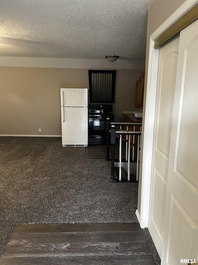 11729 Kevin Ln, Carterville, IL 62918 - corridor with baseboards and a textured ceiling