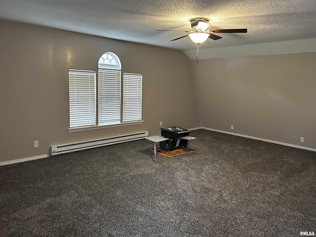 11729 Kevin Ln, Carterville, IL 62918 - carpeted empty room featuring a baseboard radiator, a ceiling fan, a textured ceiling, and baseboards