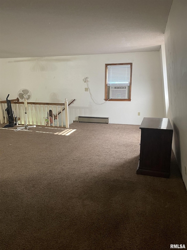 11729 Kevin Ln, Carterville, IL 62918 - carpeted empty room with a baseboard radiator and cooling unit