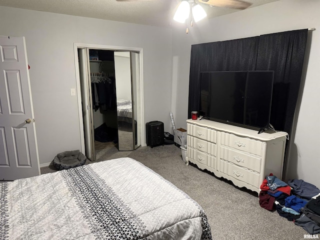 11729 Kevin Ln, Carterville, IL 62918 - carpeted bedroom with a closet and a ceiling fan