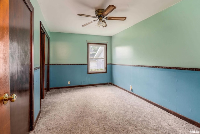 1104 Barham Ave, Johnston City, IL 62951 - unfurnished room featuring carpet flooring, ceiling fan, and baseboards