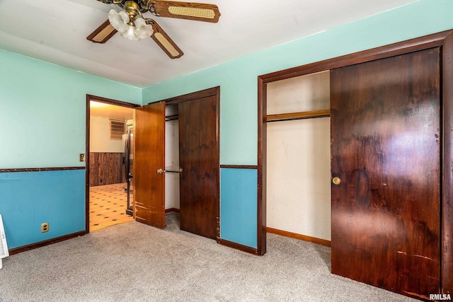 1104 Barham Ave, Johnston City, IL 62951 - unfurnished bedroom with carpet floors, baseboards, and a ceiling fan